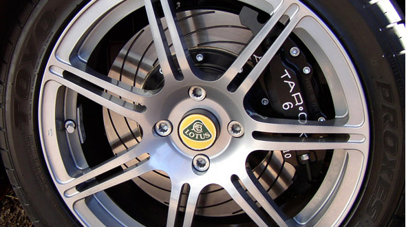 A detailed shot of a Tarox brake disc fitted to a Lotus