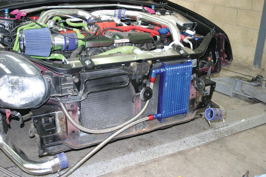 An oil cooler next to intercooler and radiator