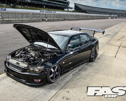 A black Lexus IS 300 with an open bonnet