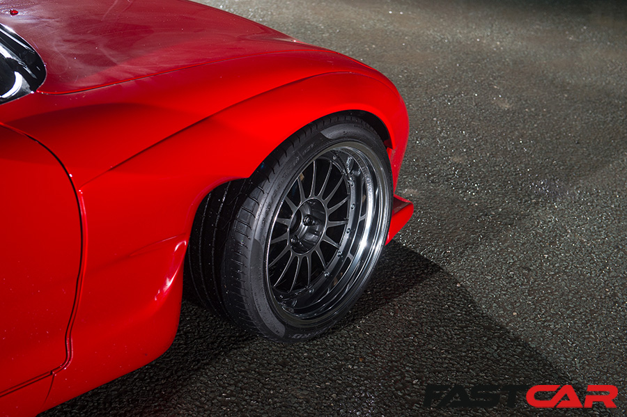 Front wheels and over-fender on F20C powered Mazda RX-7 with high performance tires 