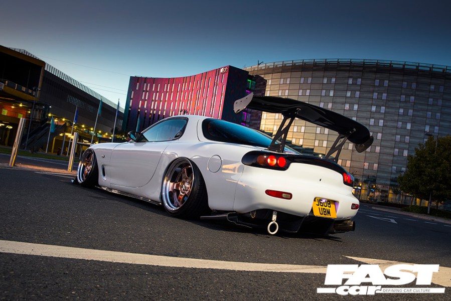 Rear shot of a Stanced mazda rx-7 FD on air ride with SSR SP1 Wheels
