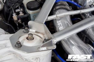 Strut braces are an inobtrusive way of giving your car more rigidity. 
