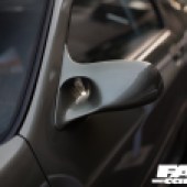 Close up shot of the front left wing mirror of the Mazda RX 7 FC Japana