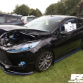 Black car with bright blue details at the Forge Action Day 2019