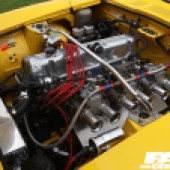 inside the bonnet of a modified yellow car at the Forge Action Day 2019