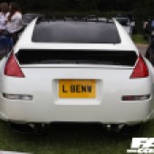 Rear view of a white car with 'L BENN' license at the Forge Action Day 2019