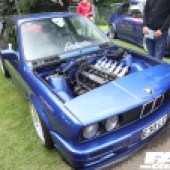 Bright blue BMW with no bonnet at the Forge Action Day 2019