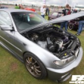 Dark grey car with an open bonnet at the Forge Action Day 2019