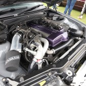 Engine inside a dark grey car at the Forge Action Day 2019