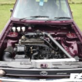 Aerial frontal view of a burgundy VW G60 at the Forge Action Day 2019