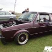 Left side shot of a Burgandy VW G60 with silver alloys at the Forge Action Day 2019