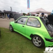 Rear left side view of a bright green Ford at the Forge Action Day 2019