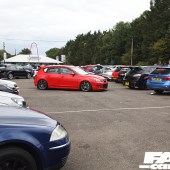 Distance shot of the right side of a red car at the Forge Action Day 2019