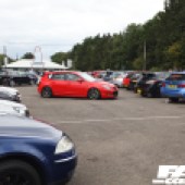 Distance shot of the right side of a red car at the Forge Action Day 2019