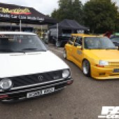 Frontal view of a yellow and a white VW at the Forge Action Day 2019