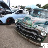 Frontal shot of a worn green Chevrolet 3100 truck at the Forge Action Day 2019
