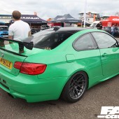 Mint green BMW with a black spoiler at the Forge Action Day 2019