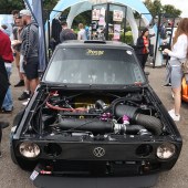 Black engine inside a black and gold VW at the Forge Action Day 2019