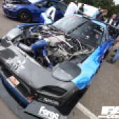 Blue and black modified Mazda RX7 with no bonnet at the Forge Action Day 2019