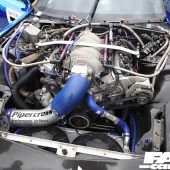 Blue, silver and black engine of a Mazda RX7 at the Forge Action Day 2019