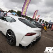 Rear left shot of a white Toyota Supra at the Forge Action Day 2019