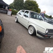 Right front shot of a white VW with silver alloys at the Forge Action Day 2019