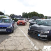 Blue Ford and a black Mitsubishi in a cluster of cars at the Forge Action Day 2019