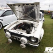 White Ford Escort with an open bonnet at the Forge Action Day 2019