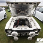Front bonnet shot of a white Ford Escort at the Forge Action Day 2019