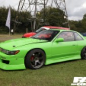 Left side of a neon green Nissan Silvia at the Forge Action Day 2019