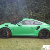 Left side of a bright green Porsche 911 GT3 at the Forge Action Day 2019