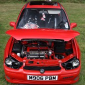 Front shot of a red Vauxhall Opel with an open bonnet at the Forge Action Day 2019
