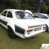 Black and white Ford Escort, rear left view at the Forge Action Day 2019