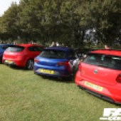 A row of four cars, two red, two blue at the Forge Action Day 2019