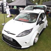A white Ford Fiesta RS WRC at the Forge Action Day 2019