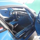 View into the passenger seat of a mint green BMW Z4 GT3 at the Forge Action Day 2019
