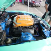 Side view of the engine from a mint green BMW Z4 GT3 at the Forge Action Day 2019