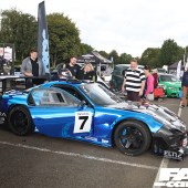 right side shot of a black and blue Mazda EX 7 at the Forge Action Day 2019