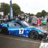 right side shot of a black and blue Mazda EX 7 at the Forge Action Day 2019