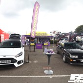A white Ford and a black Audi in front of the Powerflex stall at the Forge Action Day 2019