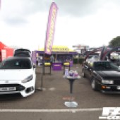 A white Ford and a black Audi in front of the Powerflex stall at the Forge Action Day 2019