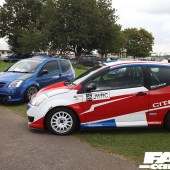 The left side of a blue, red and white Citroen C2 at the Forge Action Day 2019