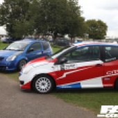 The left side of a blue, red and white Citroen C2 at the Forge Action Day 2019