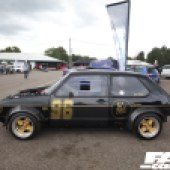 A left side shot of a black and gold VW Gold Mk1 at the Forge Action Day 2019