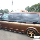The left side of a black and bronze VW Transporter T5 at the Forge Action Day 2019