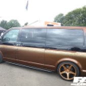 The left side of a black and bronze VW Transporter T5 at the Forge Action Day 2019