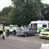A police car, police van and a BMW 3 Series at the Forge Action Day 2019