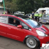 A right side view of a red Honda Fit at the Forge Action Day 2019