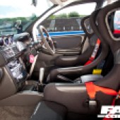View across the front seats of a carbon fiber Subaru Impreza