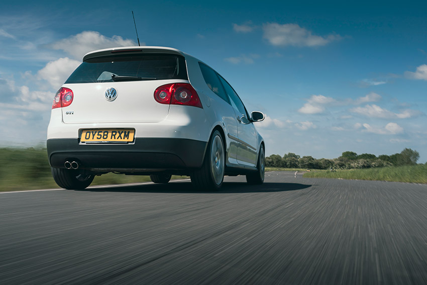 Rear driving shot of VW golf GTI Mk5